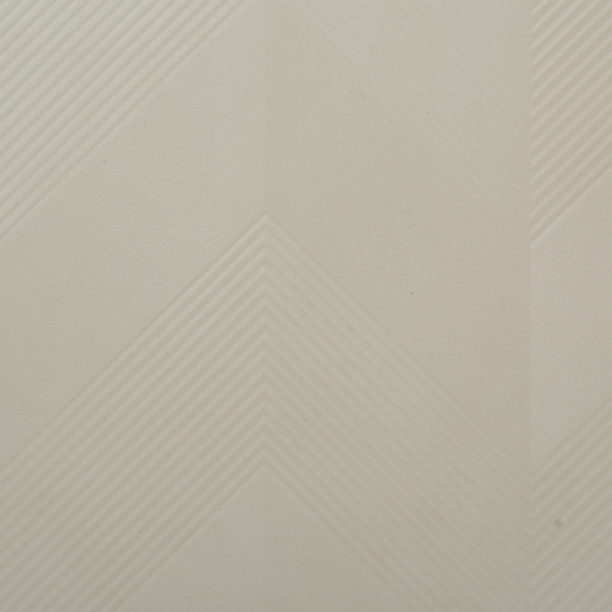 Plyneer EL-1001 taupe laminate with subtle embossed chevron texture from Elite Lite series.