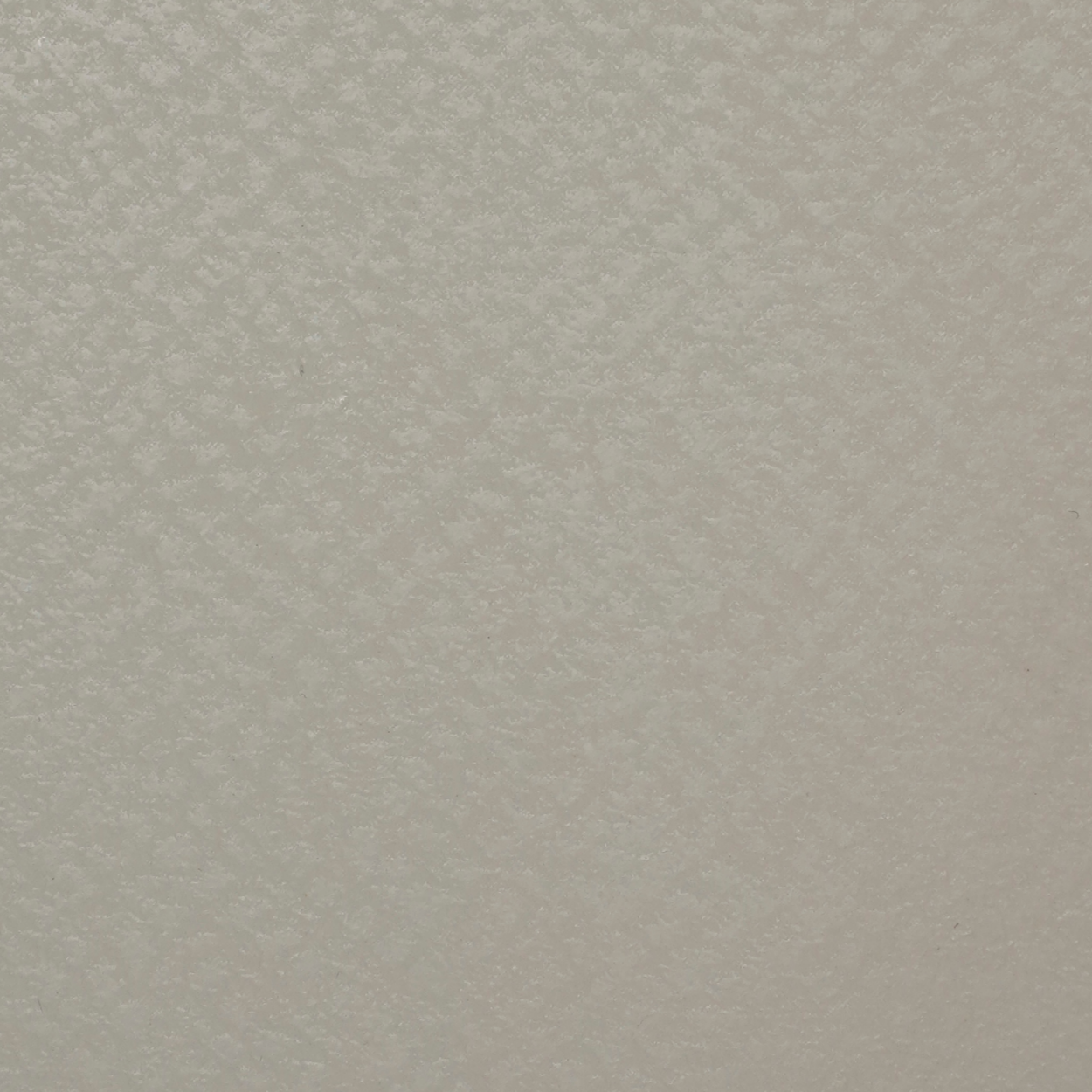 PL-124 light silver laminate with pebble texture and soft matte sheen by Plyneer