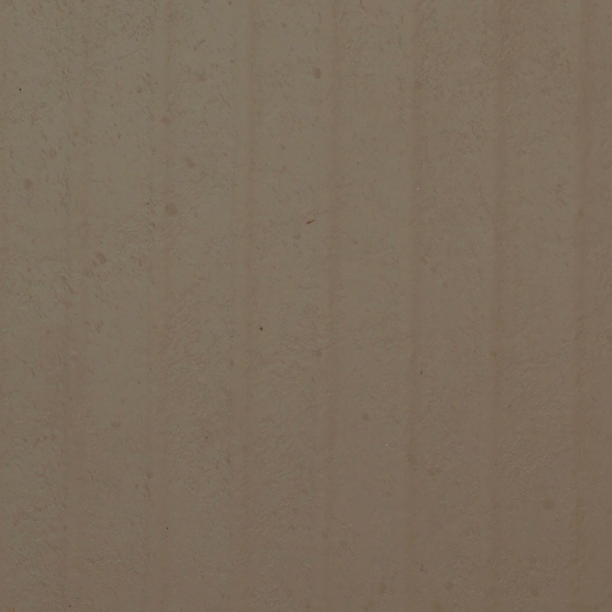 PL-133 Taupe Stone laminate with vertical linear stone texture and matte taupe finish by Plyneer.