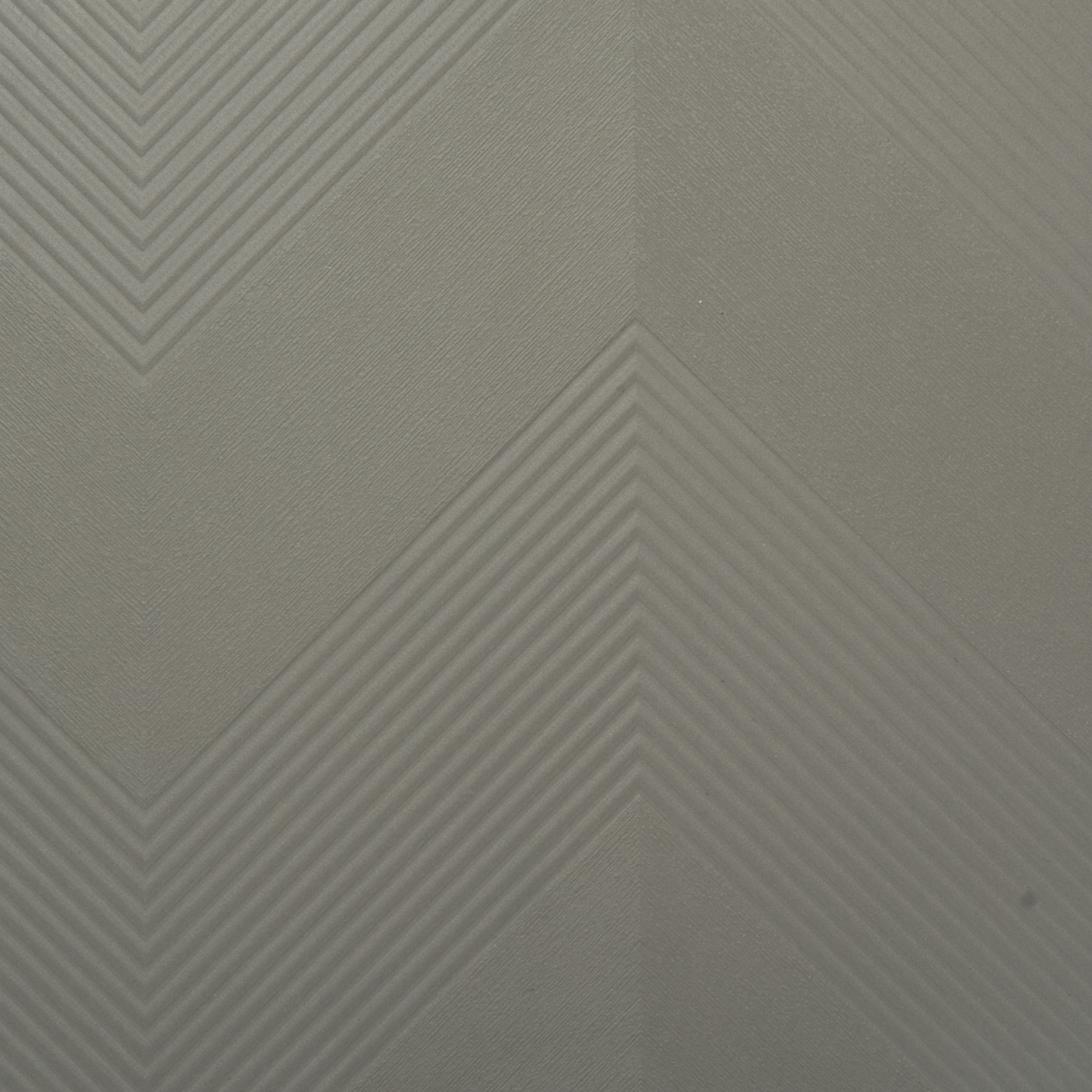 Plyneer EL-1004 graphite grey laminate with embossed chevron pattern from Elite Lite series.