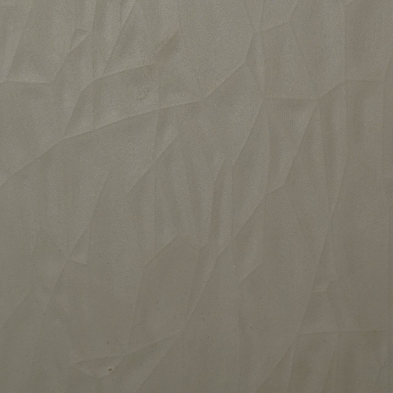 PL-117 silver grey laminate with geometric prism texture and matte 3D finish by Plyneer.